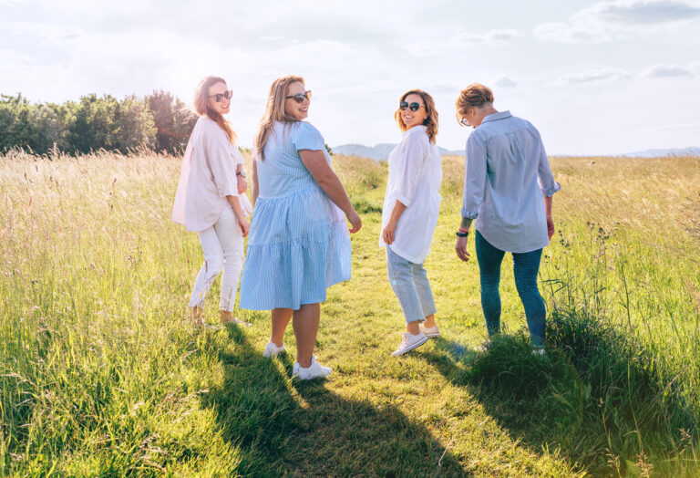 four middleaged women walking for sciatica