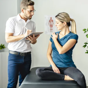 A woman answering to a questionnaire for her chiropractor.